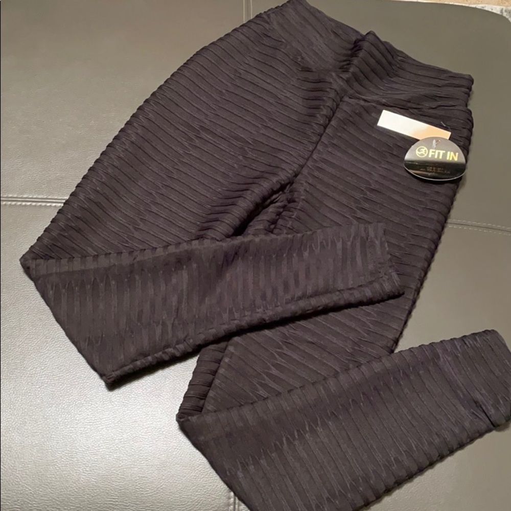 Black ribbed leggings. Great support/sexy